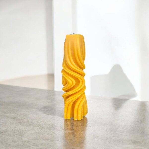 Beeswax candles made from pure New Zealand beeswax, offering a natural honey scent and a warm, golden glow.